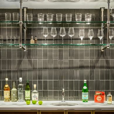 Ceiling-mounted Ball style Bistro Designer Shelving in polished nickel with glass shelves