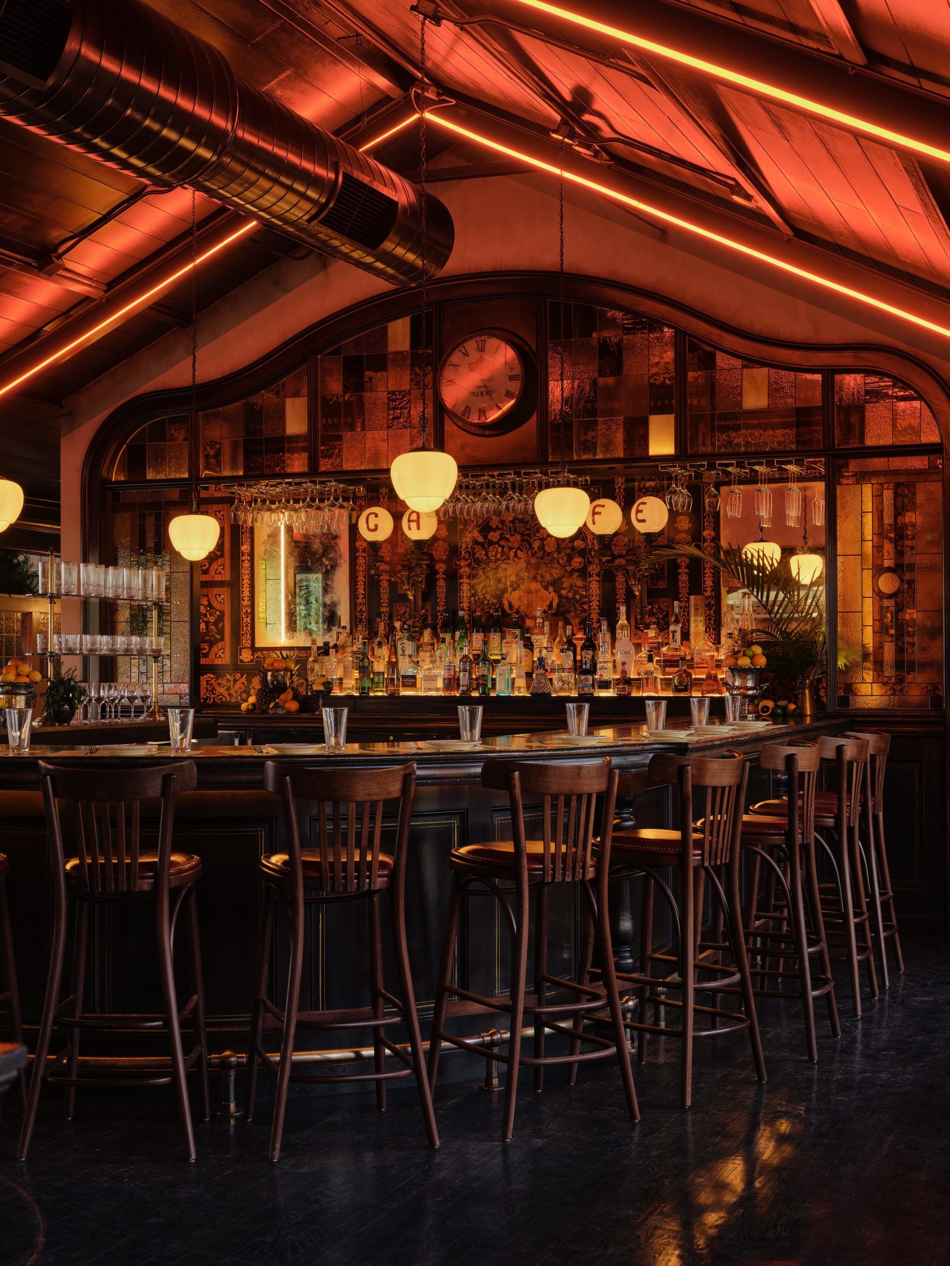 El royal cafe, warm lit cafe with palmer stemware